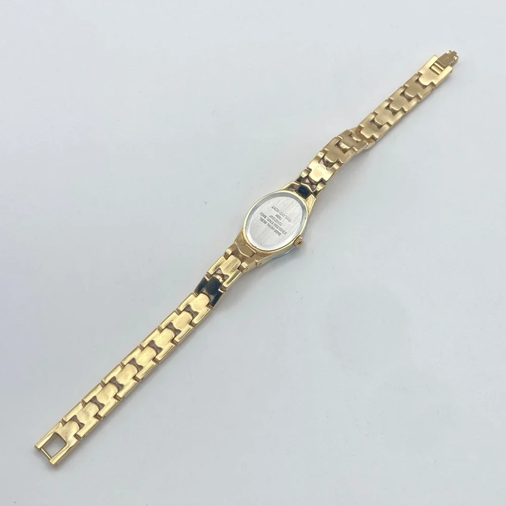 Armitron Now Women's Watch 17mm Gold Tone Blue Dial Faceted New Battery 6.75